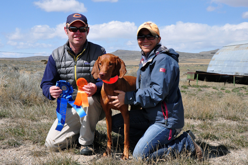 Aaron, Mel, and Amante celebrating her Master Hunter qualify and Amateur Gun Dog 3 point retrieving major win